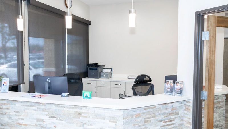 The welcoming front desk at Modesto Dentistry And Implants